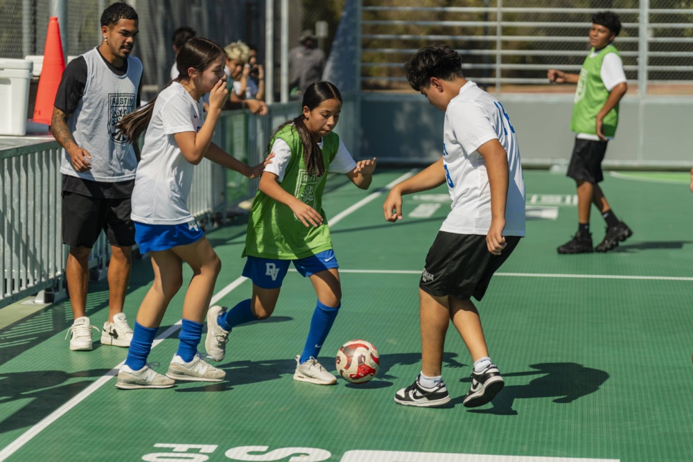 Kids playing on mini-pitch